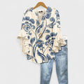Blusa con scollo a V e maniche a balze