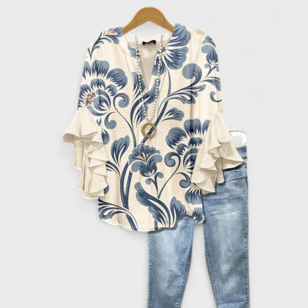 Blusa con scollo a V e maniche a balze