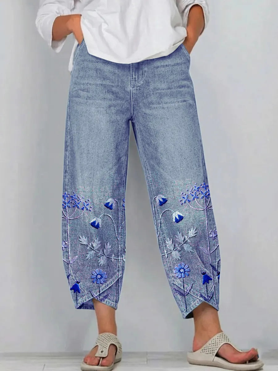 Pantaloni a gamba larga a vita alta con piega e tasche