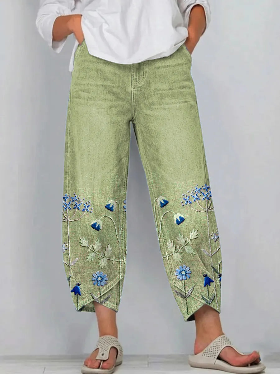 Pantaloni a gamba larga a vita alta con piega e tasche