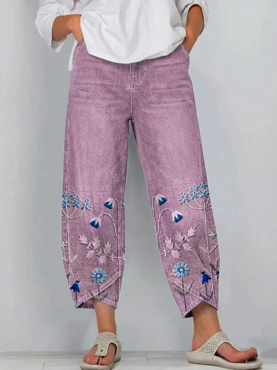 Pantaloni a gamba larga a vita alta con piega e tasche