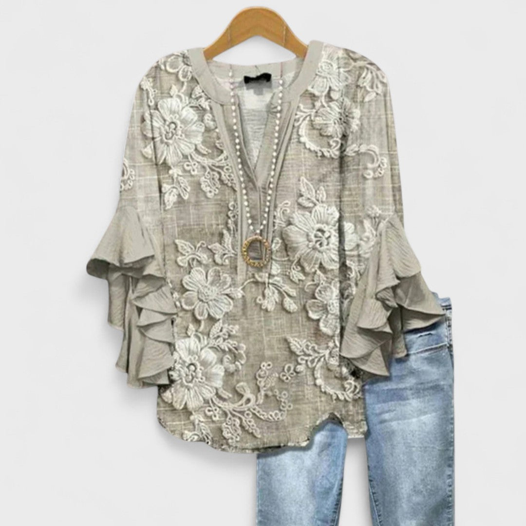Blusa con scollo a V e maniche a balze