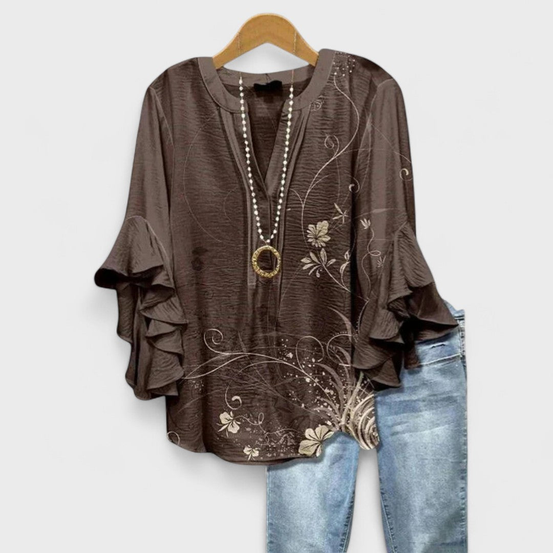 Blusa con scollo a V e maniche a balze