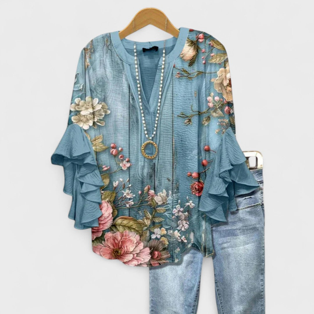 Blusa con scollo a V e maniche a balze