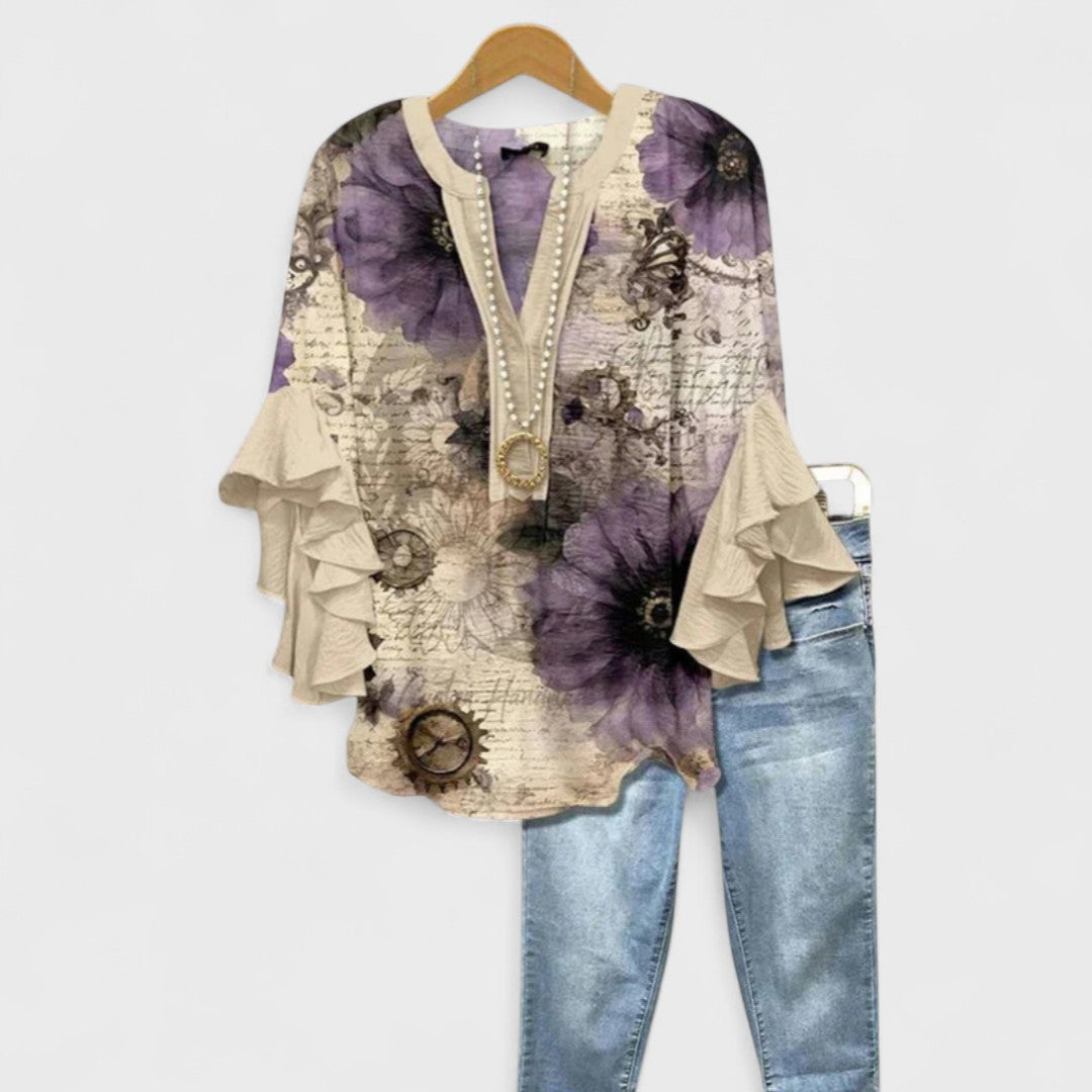 Blusa con scollo a V e maniche a balze