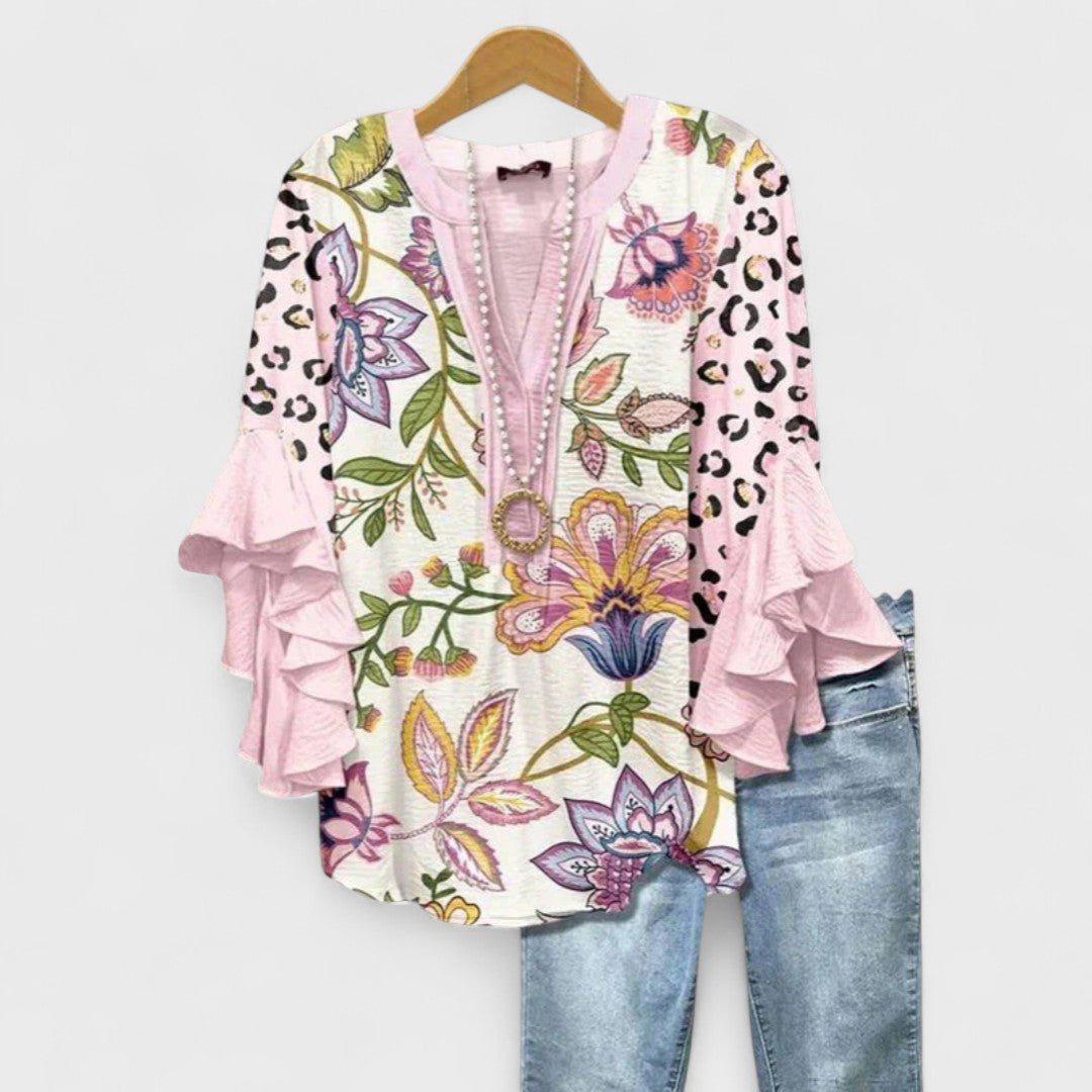 Blusa con scollo a V e maniche a balze