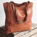 Borsa a mano con zip e ampio scomparto interno
