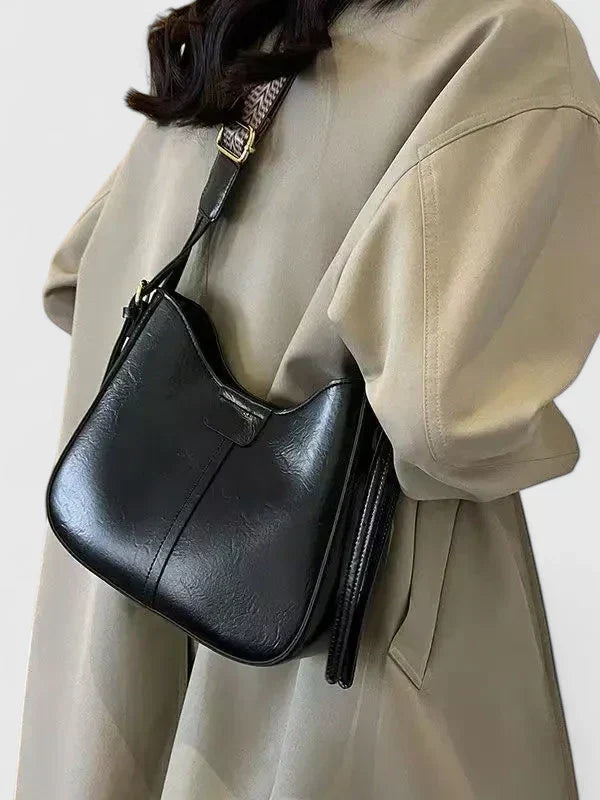 Borsa a spalla dalla linea sottile con ampio interno