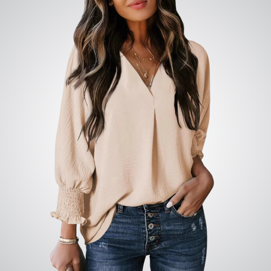 Blusa a tunica con scollo a V