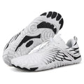 Sneakers sportive bicolore con lacci e suola flessibile