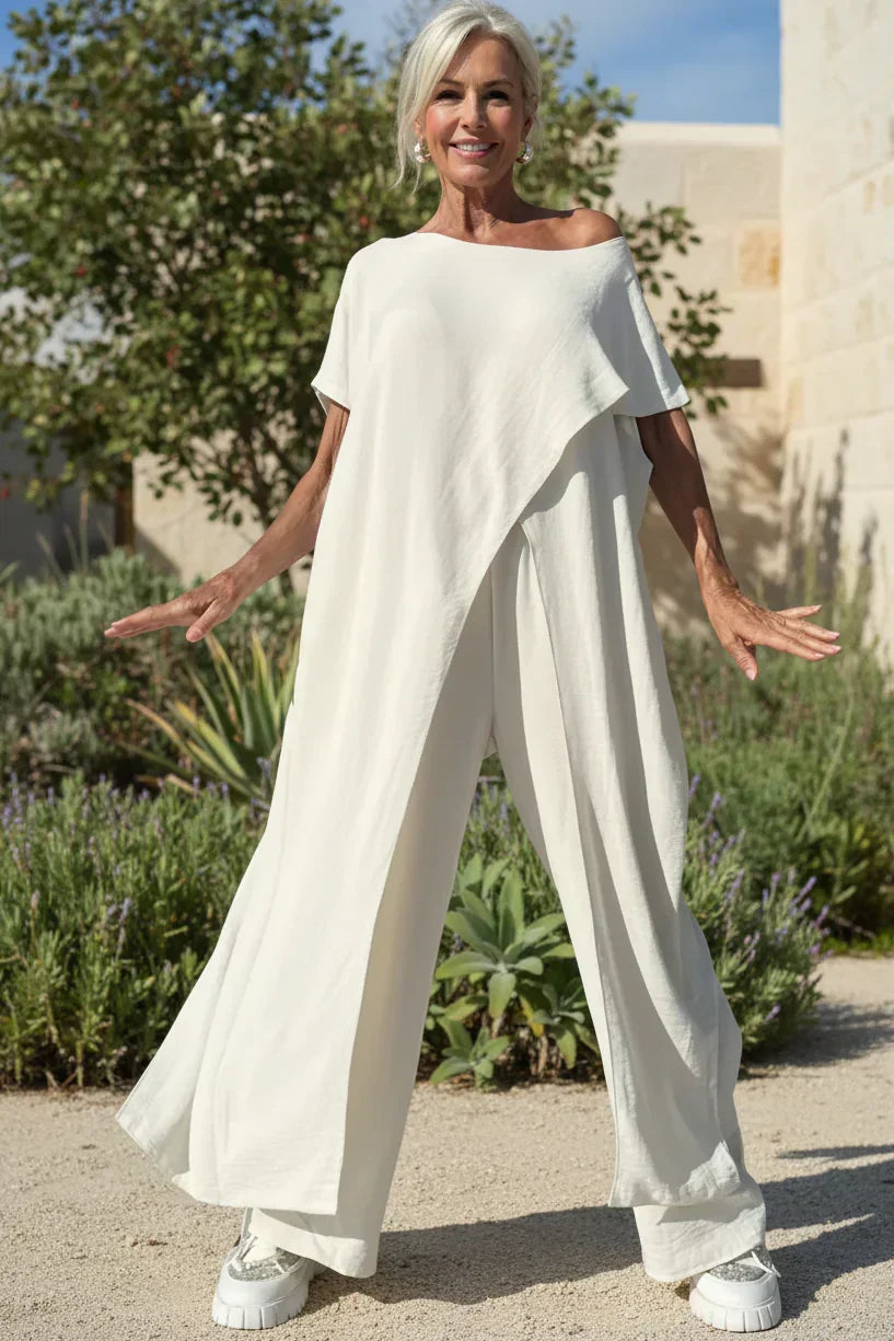 Completo con top asimmetrico e pantaloni a gamba larga