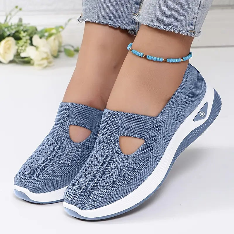 Scarpe slip on con pianta ampia e suola con battistrada