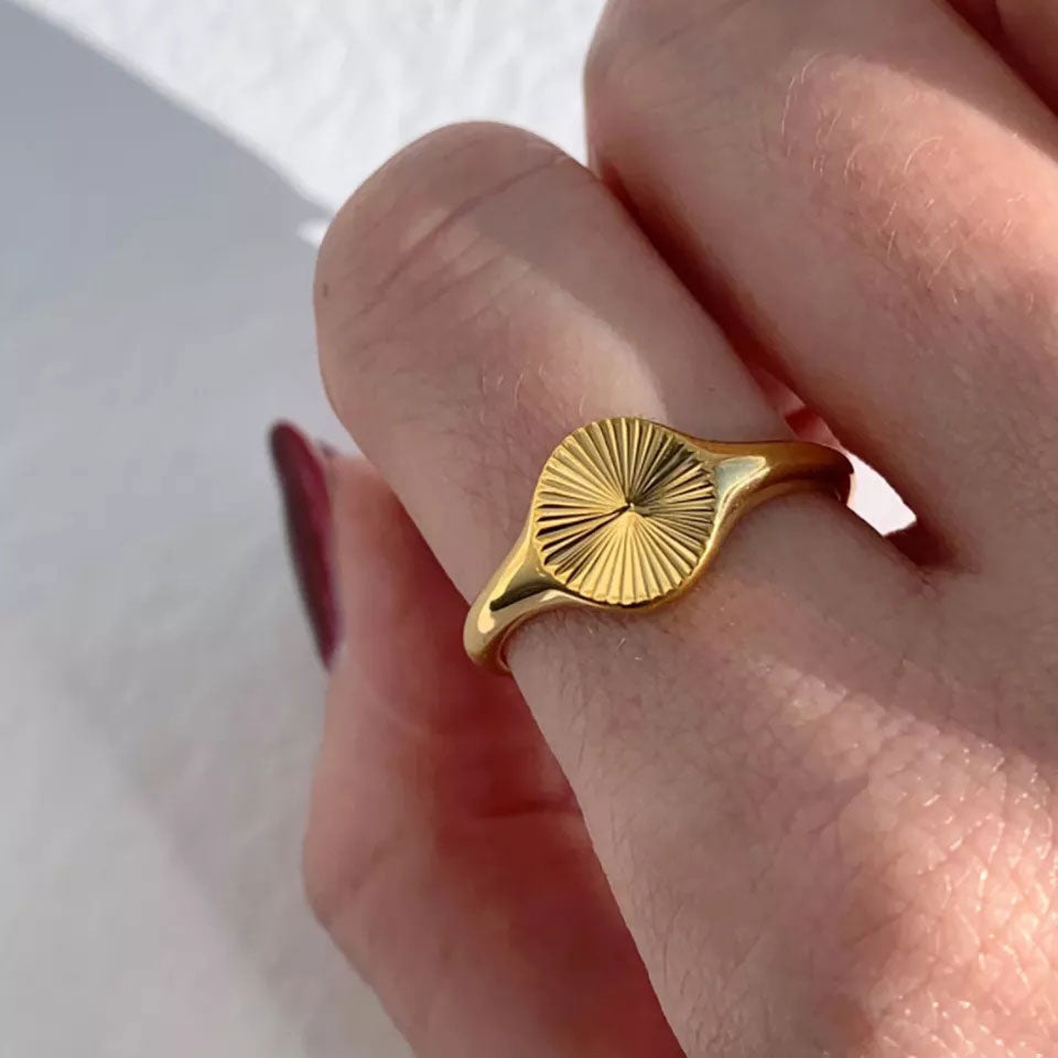 Anello con motivo a girasole