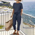 Completo con top a portafoglio e pantaloni sartoriali