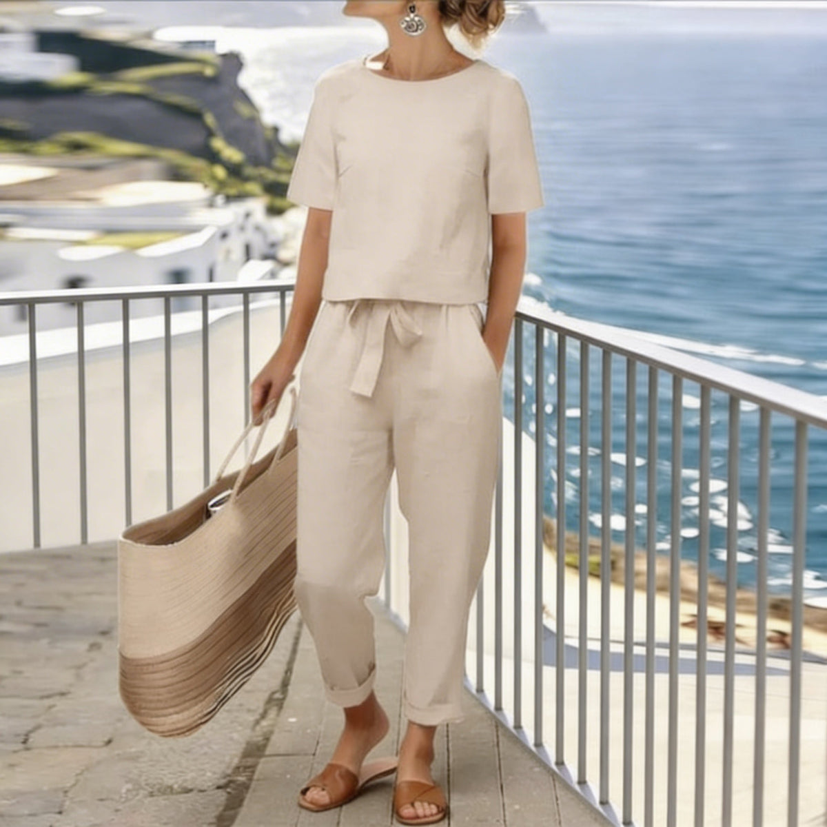Completo con top a portafoglio e pantaloni sartoriali
