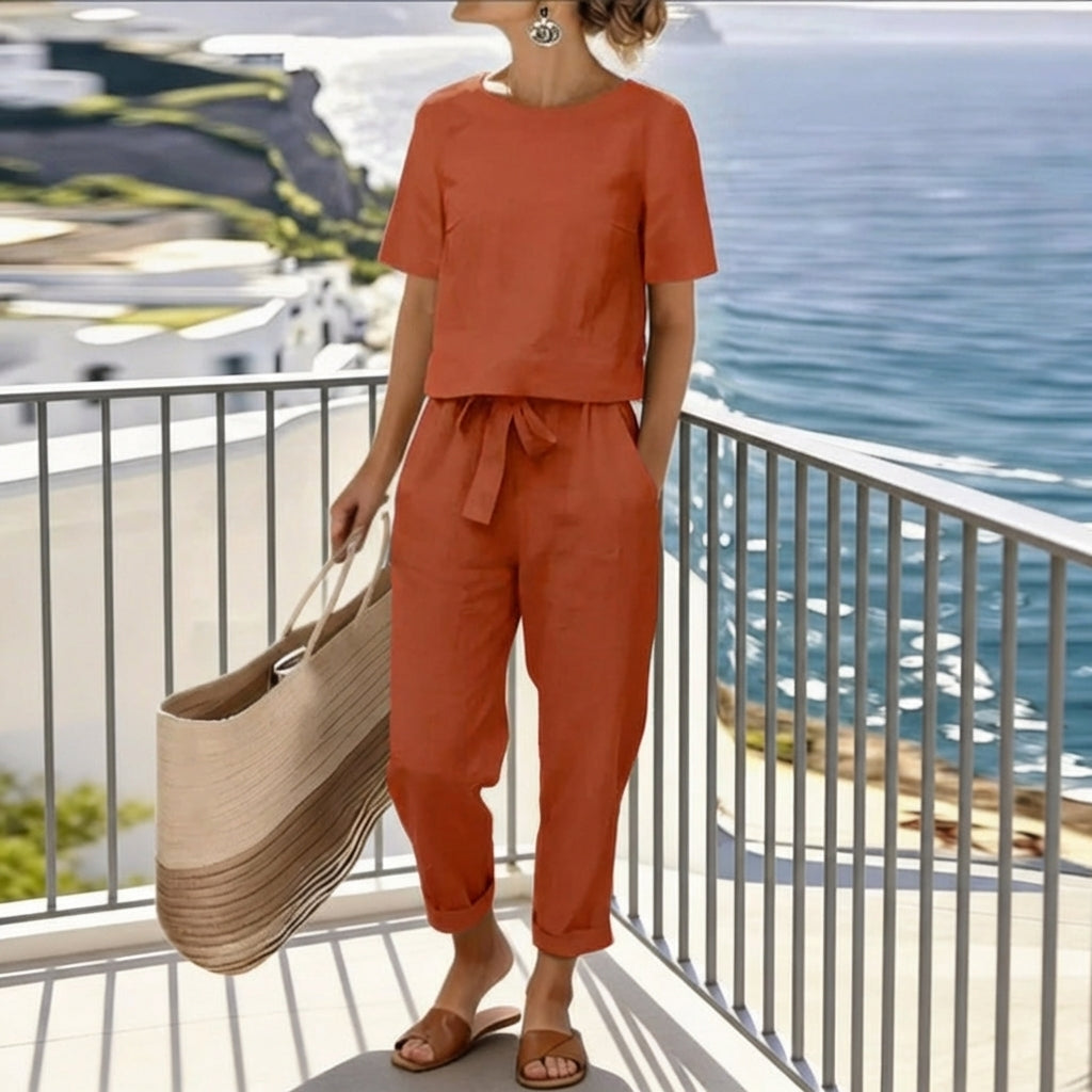 Completo con top a portafoglio e pantaloni sartoriali