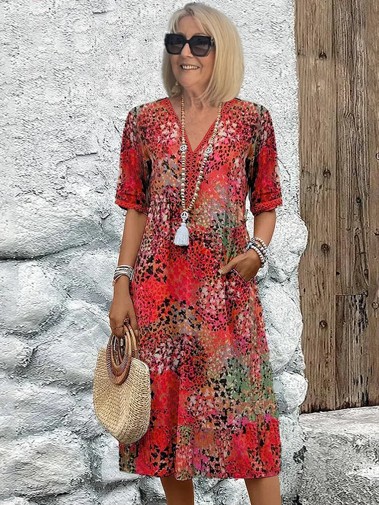 Abito midi con tasche e modello da infilare