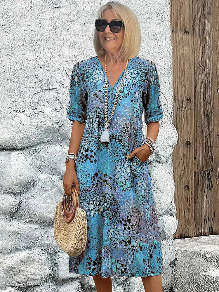 Abito midi con tasche e modello da infilare