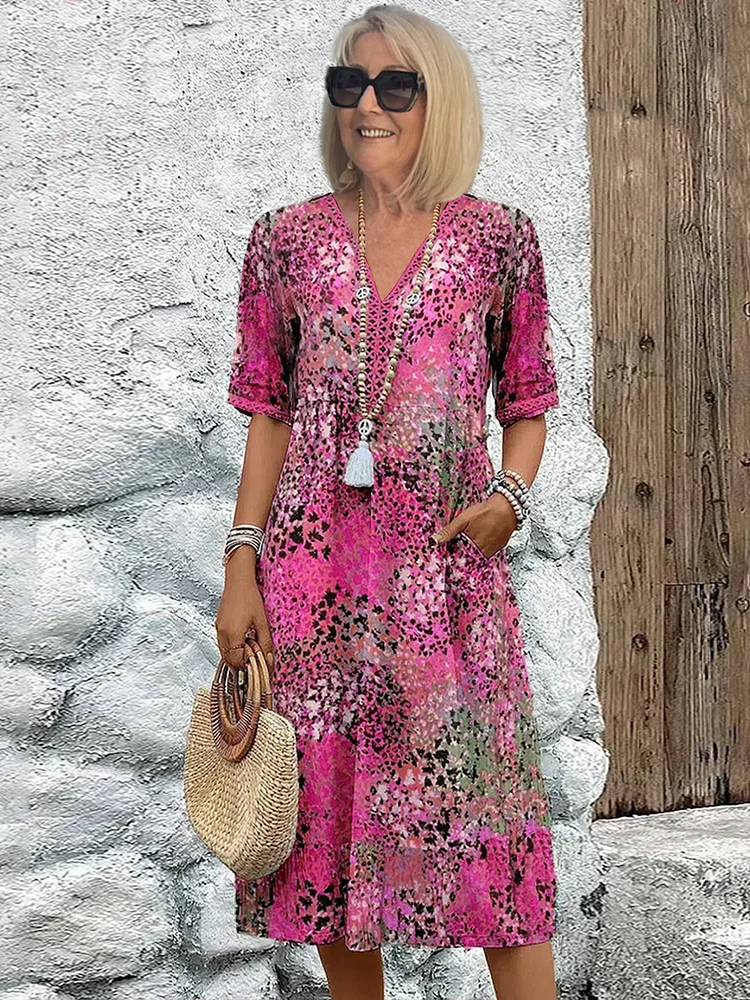 Abito midi con tasche e modello da infilare