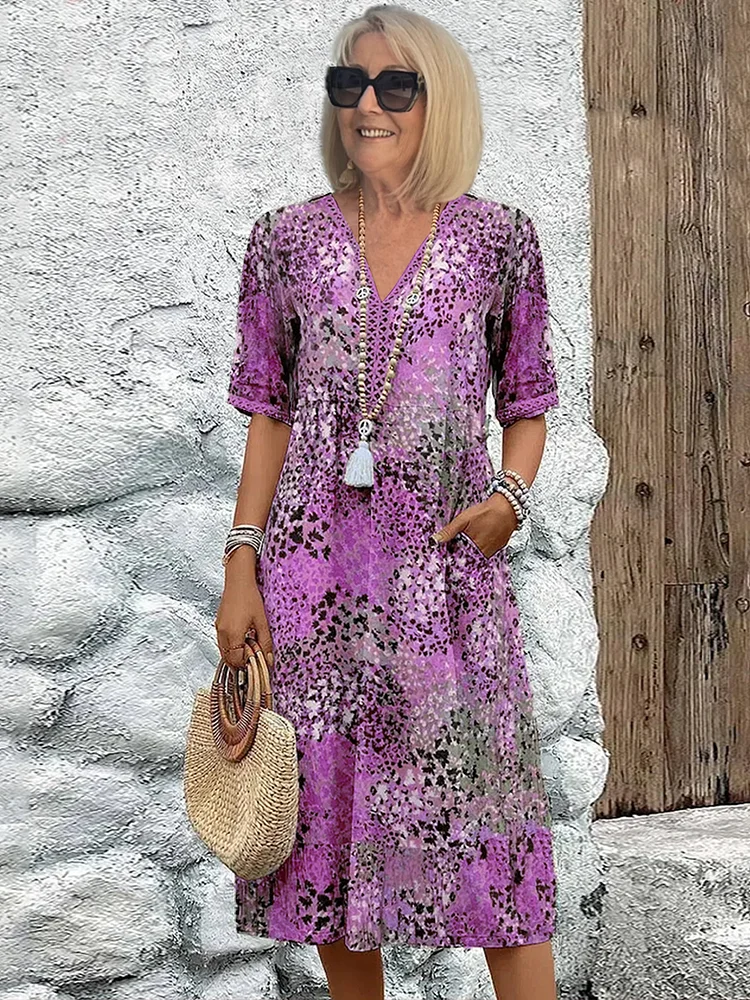 Abito midi con tasche e modello da infilare